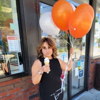 JUDY MARKOWITZ with holding ice cream and balloons